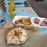 Vegan crunchwrap and fries   at Vegan Van @ Park Hill Kitchens in Denver