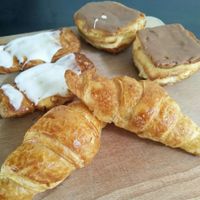 Vegan croissant, frangipane and pudding pastry with chocolate frosting at Bakkerij Jonas in Ghent
