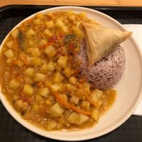Chickpea curry with a samosa at Red Curry House in Nuremberg