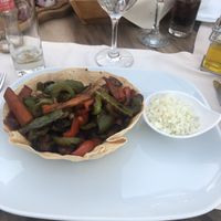 Vegan fajitas (mushrooms, peppers, onions) in a crispy wrap with rice  at Kastro 1380 in Parga