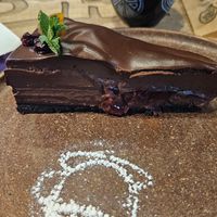 Cherry chocolate cheesecake made with tofu at Tucano Coffee Costa Rica in Chisinau