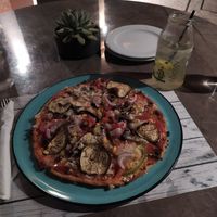 Homemade vegan pizza with grated tofu at Enasma Cafe in Crete