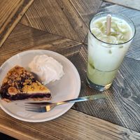 Blueberry pie with vegan cream, and iced vanilla soy matcha at Espresso House in Molde
