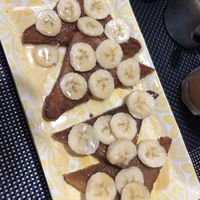 Coffee Maple French toast with banana (~8€)  at Caffè dell'Arte Specialty Coffee in Cagliari