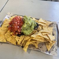 Nachos con guacamole y pico de gallo  at Tierra Burrito Bar - Debod in Madrid