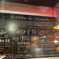 History of the francesinhas - a charming handwritten mural inside the cafe   at Puro in Lisbon