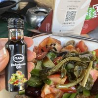 They bring the vinegar in tiny bottles!  at Aktaion in Rhodes