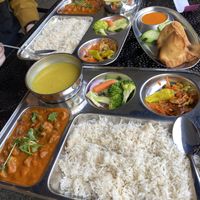 chana and mushroom thalis with samosas  at Wildberry Restaurant in Ashford