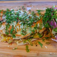 "Make it vegan" vegetable quesadilla (vegan cheese and squash inside) and custom crispy corn taco at Turco Taco in Naples