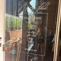 Front door and opening hours  at North Folk in Kolding