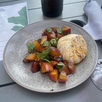 Burrata with stone grilled fruits   at Black Radish in Tallahassee