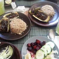 menú: zapallo italiano relleno y arroz at Govindas in La Serena