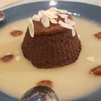 Chocolate fondant with creme anglaise at Le Jardin in Biarritz
