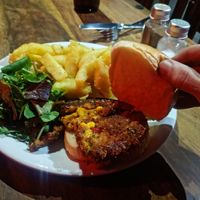 Vegan burger, Tues and Thurs 6pm-9. Good plateful with a drink for £10. Couldn't name the burger, they might make it themselves. Corn, peas, crunchy batter. Good value! at The Black Bull in Gateshead