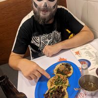 Tacos and a skeleton at Taqueria De La Union in Merida