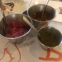 Salsas and onions at Taqueria De La Union in Merida