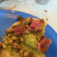 Guacamole con Maíz taco with added onion and salsa   at Taqueria De La Union in Merida