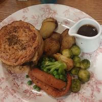 Mushroom & Ale Pie served with maple-roast carrots, seasonal veg and balsamic gravy with your choice of oven-baked chips or roasted baby potatoes at Blacksmiths Arms in Macclesfield