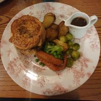 Mushroom & Ale Pie served with maple-roast carrots, seasonal veg and balsamic gravy with your choice of oven-baked chips or roasted baby potatoes at Blacksmiths Arms in Macclesfield
