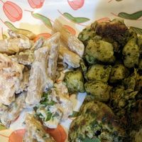 Creamy mushroom penne with Italian sausage and gnocchi pesto with chicken at Vegano in Bangkok