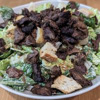 Caesar Crunch Salad with Beyond Steak at Veggie Grill by Next Level in Beaverton