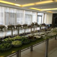 The lunch spread. To the left is the buffet line, to the right the hot pot selection. All this is yours for ¥65, or just ¥25 if you only want the buffet at Zhong Nong Jian Kang Jia Yuan in Kunming