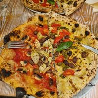 Pizza Primavera and Pizza Puttanesca at Con Gusto - Schmiede Wiedikon in Zurich