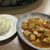 Tofu and tomatoes, with Chinese plain bun  at Salima Restaurant in Mae Salong
