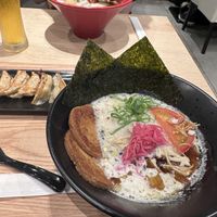 Vegan ramen (black bowl) and gyoza  at Ippudo 博多 一風堂 Plant Based Studio in Tokyo