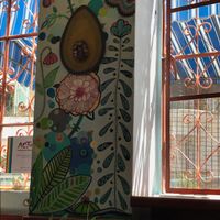 beautiful paintings in the front wall at Salud Super Food in Puerto Vallarta
