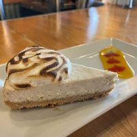 Vegan key lime cheesecake with pineapple sauce on the side at The Cafe in Key West