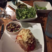 „meatball“-sandwich with vegan cheese, dumplings (veganized) & edamame at The Cafe in Key West
