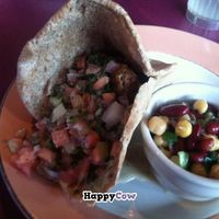 Curried 'chicken' salad sandwich with side salad and falafel sandwich with marinated bean salad.  at The Cafe in Key West