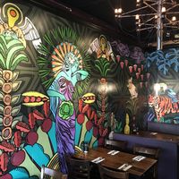 Two dinning areas. Both are very colorful   at The Cafe in Key West