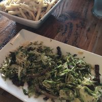 My meal: truffles fries, vegan mozzarella, shaved Brussels sprouts with portobello “bacon" at The Cafe in Key West
