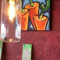 A colorful and funky decor welcomes you at The Cafe in Key West