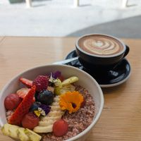 Oat bowl and coffee at Black and White Coffee Shop in Lagos