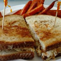 Tempe Reuben sandwich. This sandwich was amazing great restaurant some of the vegan options friendly staff quaint atmosphere I recommend this for anyone girls vegan or not vegan at Bella Vida Cafe in West Cape May