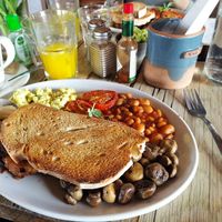 The Vegan "Brunch", with the breakfast (13£), the orange juice (4.5£) and the coffee (2.95£). at Mud Dock in Bristol