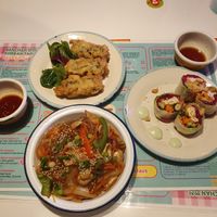Crispy fried seat rolls, sushi with crispy Tofu and noodles with mushroom at Kkokki Vegan House in Hamburg