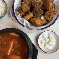 #36 - Kkokki NoNo Chicken combo with tofu + cauliflower and soy garlic sauce, #42 Suntofu Kimchi Jjigae   at Kkokki Vegan House in Hamburg