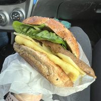 Vegan breakfast sandwich on an everything bagel and with veggie sausage   at Cravings PDX in Portland