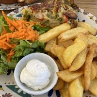 Vegan omelette (chickpea based), chips and salad  at Humus Vegan Tenerife in Tenerife