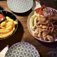 Vegan Gyros with Hummus and extra fries 😋  at Happy Friends in Rhodes