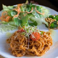 Raw pasta with tomato sauce and salad.  at Raw8 Cafe in Osaka