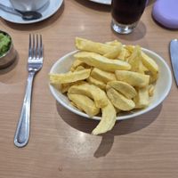 Not very impressed  not even on a plate, 2 side dishes. at The Dolphin Restaurant in Ilfracombe