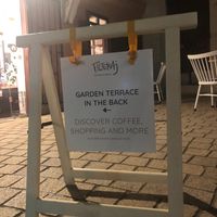 Terrible picture of the Filteraj swing sign board outside the cafe at night. But it easy to walk past the door! at Filteraj Specialty Coffee & Shop in Zagreb