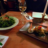 Starters: Seasonal green salad (Feldsalat) on the left, and cashew creamcheese with vegetables on the right. at Körle und Adam in Stuttgart