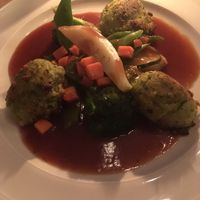 Potato and polenta croquettes with veggies and red wine sauce at Körle und Adam in Stuttgart