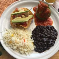 Stuffed courgette, cauliflower ceviche, rice and beans at Puerto Verde in Puerto Morelos